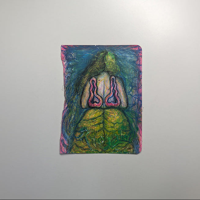 A small colorful art print or painting showing a stylized figure from behind with green and yellow tones, blue hair, and pink accents, photographed against a plain light gray wall.
